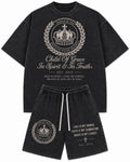 Crest Set Onyx — washed black tee and shorts with cream embroidery