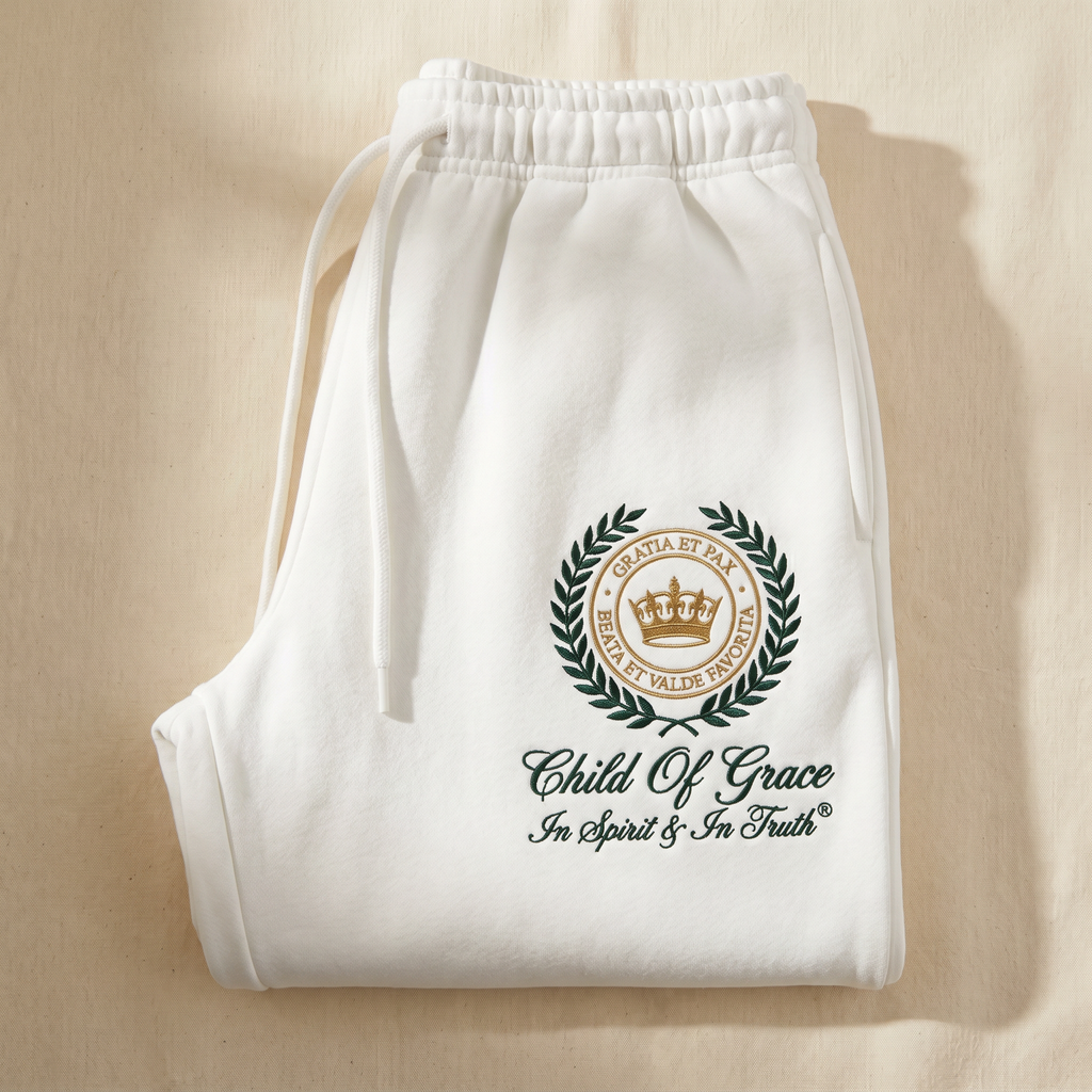 Genesis Crest Sweatpants — Cloud White with hunter green and antique gold embroidered crest, folded flat-lay